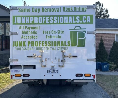 rear view of junk professionals' truck which going to pick up junk