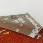 Carpet is being removed under the carpet removal service by junk professionals